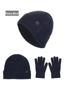 Navy blue ribbed knit beanie with thick fleece lining and matching gloves set