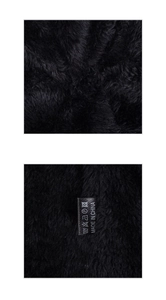 Close-up of thick black faux fur lining with washing care label and made in China tag