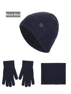 Three-piece winter knit set including fleece-lined navy blue beanie, gloves, and neck gaiter