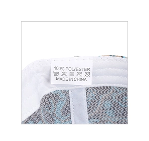 Detail view of the internal washing label showing 100% polyester material and origin