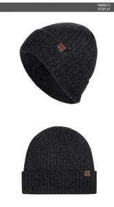 Detail view of winter knitted beanie with thick fleece lining and ribbed texture