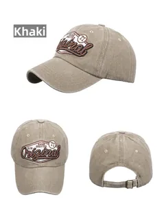 Detail view of khaki washed cotton baseball cap with vintage embroidery and metal buckle