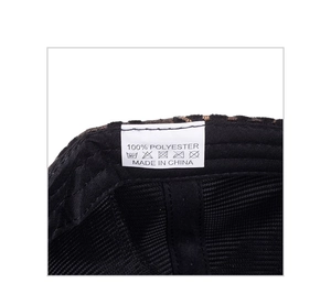 Macro detail of inner lining and fabric care label on a polyester baseball cap