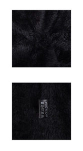 Detail view of the warm black faux fur lining and care label on the winter knitted hat