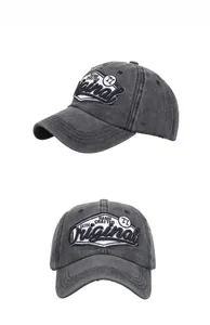 Close-up of vintage washed cotton baseball cap with 3D embroidery and distressed texture