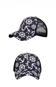 Detail of black baseball cap featuring white anchor prints and breathable mesh back