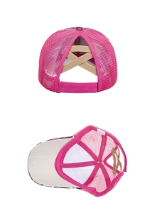Detail of rose pink ponytail mesh baseball cap showing elastic cross bands and heart pattern