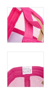 Detail view of adjustable velcro strap and breathable mesh on pink ponytail baseball cap