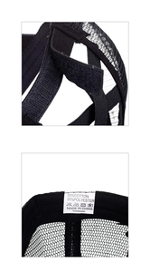 Detail of adjustable ponytail opening and breathable mesh on black cotton baseball cap