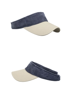 Detail of navy blue and beige contrast sun visor made of washed cotton with stitching