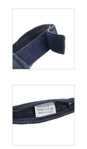 Detail of adjustable velcro strap and 100% cotton wash label on navy sports sun visor