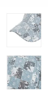 Close-up of light blue denim baseball cap featuring silver sequins and frayed edge details