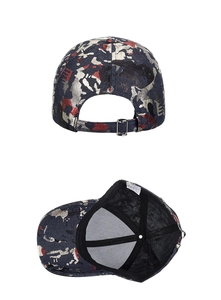 Detailed view of camo baseball cap with metal buckle and 100% polyester wash label