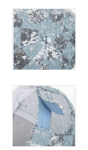 Detail of adjustable velcro strap and silver sequin diamond pattern on denim baseball cap