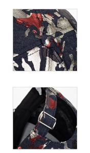 Close-up of metallic foil floral patterns and adjustable silver buckle on a baseball cap
