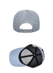 Detail view of the sequined baseball cap's adjustable strap and textured interior lining