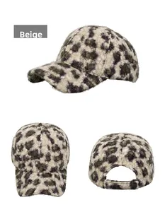 Detail view of the beige leopard print faux fur baseball cap showing plush texture