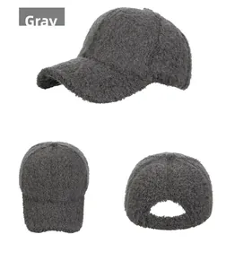 Detail view of the plush grey baseball cap showing soft texture and adjustable back buckle