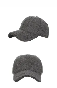 Close-up of deep gray plush texture on a warm winter baseball cap for outdoor windproof use