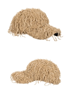 Detail view of khaki faux fur baseball cap with unique turkey feather tassel texture