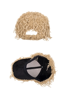 Detail of creative faux fur baseball cap featuring long tan fringe wig effect and inner mesh