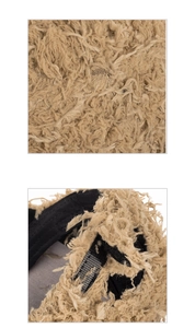 Close-up of beige faux fur texture and black lining on a thick winter baseball cap