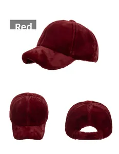 Detailed views of red plush winter baseball cap showing soft faux fur texture and back strap