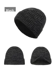 Close-up of black striped knit beanie featuring thick texture and warm fleece lining