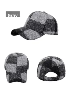 Detail view of gray checkerboard plush baseball cap showing texture and rear closure