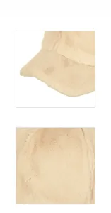 Close-up of beige faux fur texture and stitching details on a plush baseball cap