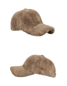 Close-up of brown plush baseball cap featuring a golden metal letter R logo detail