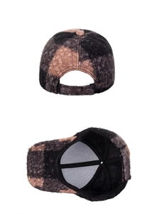 Detail view of adjustable back strap and breathable mesh lining of color-block baseball cap