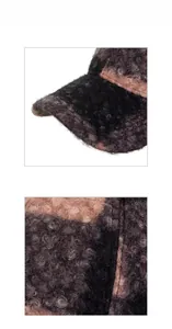 Close-up of fluffy patchwork baseball cap showing textured fleece material and neat stitching