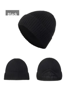 Detail view of the black knitted beanie showing thick fleece lining for winter warmth