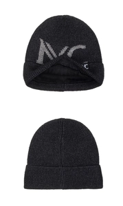Detail view of the thick fleece lining and MC knit pattern on the black winter beanie
