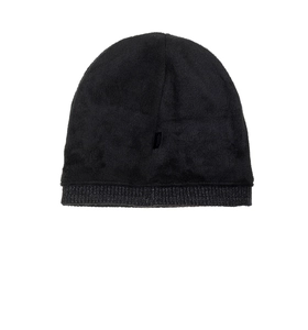 Close-up of black winter knit beanie showing thick fleece texture and ribbed cuff detail
