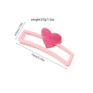 Pink heart hair claw clip for women, dopamine style hair accessory measuring 13cm in length