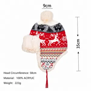 Wintermuts met rendierjacquard, oorklappen en witte pompons van imitatiebont