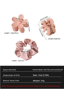 Detail view of pink matte flower hair clips and silk scrunchie set with size dimensions