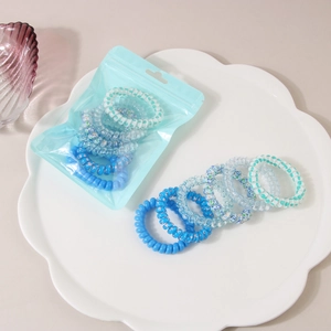 Ensemble d'élastiques à cheveux spirale bleus aux motifs variés avec pochette