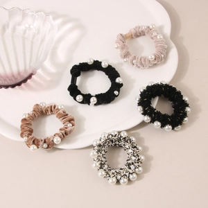 5-piece set of velvet and tweed pearl hair scrunchies in pink, black, and beige colors