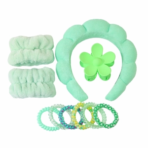 10-piece green spa headband set with matching wristbands, flower claw clip and hair ties