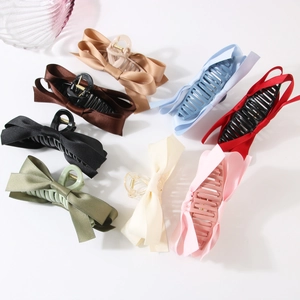 Set of 8 large satin bow shark hair clips in assorted colors for elegant hair styling