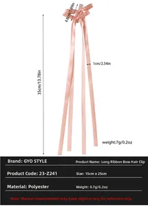 Detail view of pink long ribbon bow hair clip with 35cm length polyester streamers