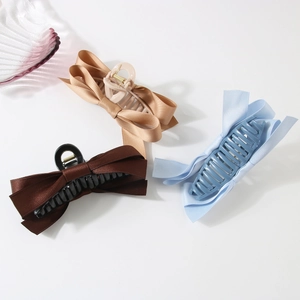 Elegant satin bow hair claw clips in coffee, champagne and blue for women's hairstyles