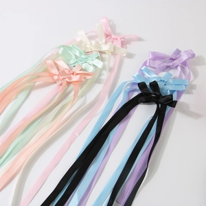 Long satin ribbon bow hair clips set in various pastel colors and elegant streamers