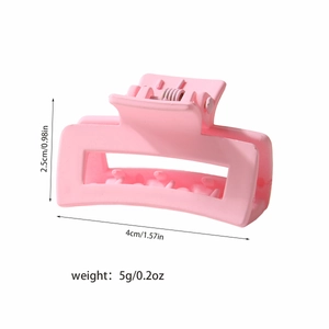 Pink matte rectangular claw clip measuring 4cm x 2.5cm with durable metal spring