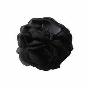 Detail view of the black fabric rose flower hair claw clip with multi-layered petals