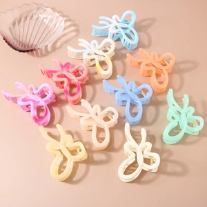 Set of large colorful butterfly hair claws in glossy resin for thick hair styling