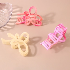 French butterfly hair claws in pink and cream yellow for thick hair styling